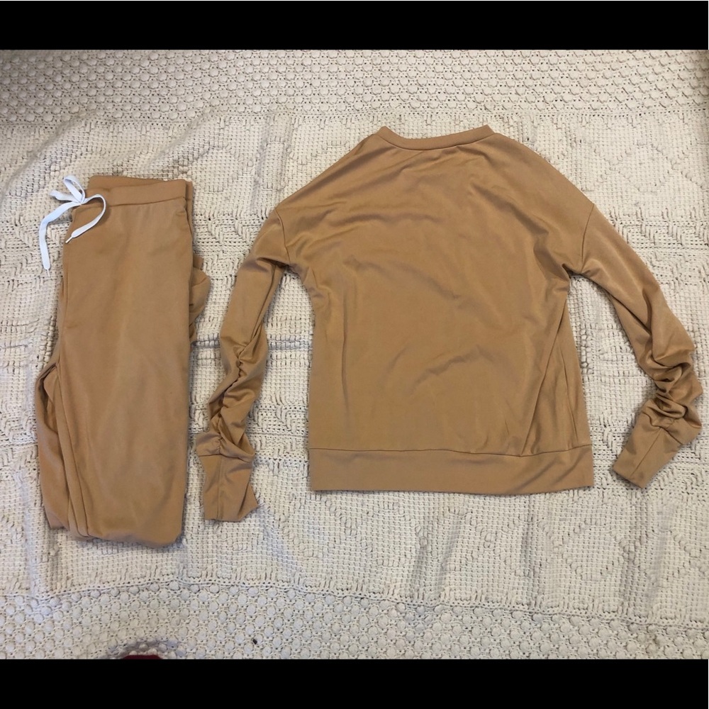 A women’s mustard yellow comfortable outfit.